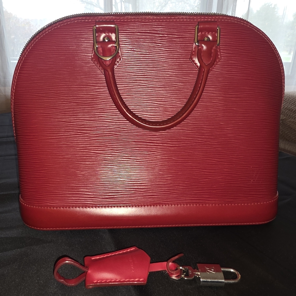 Pre-loved Louis Vuitton Alma PM Deep Red Epi Leather